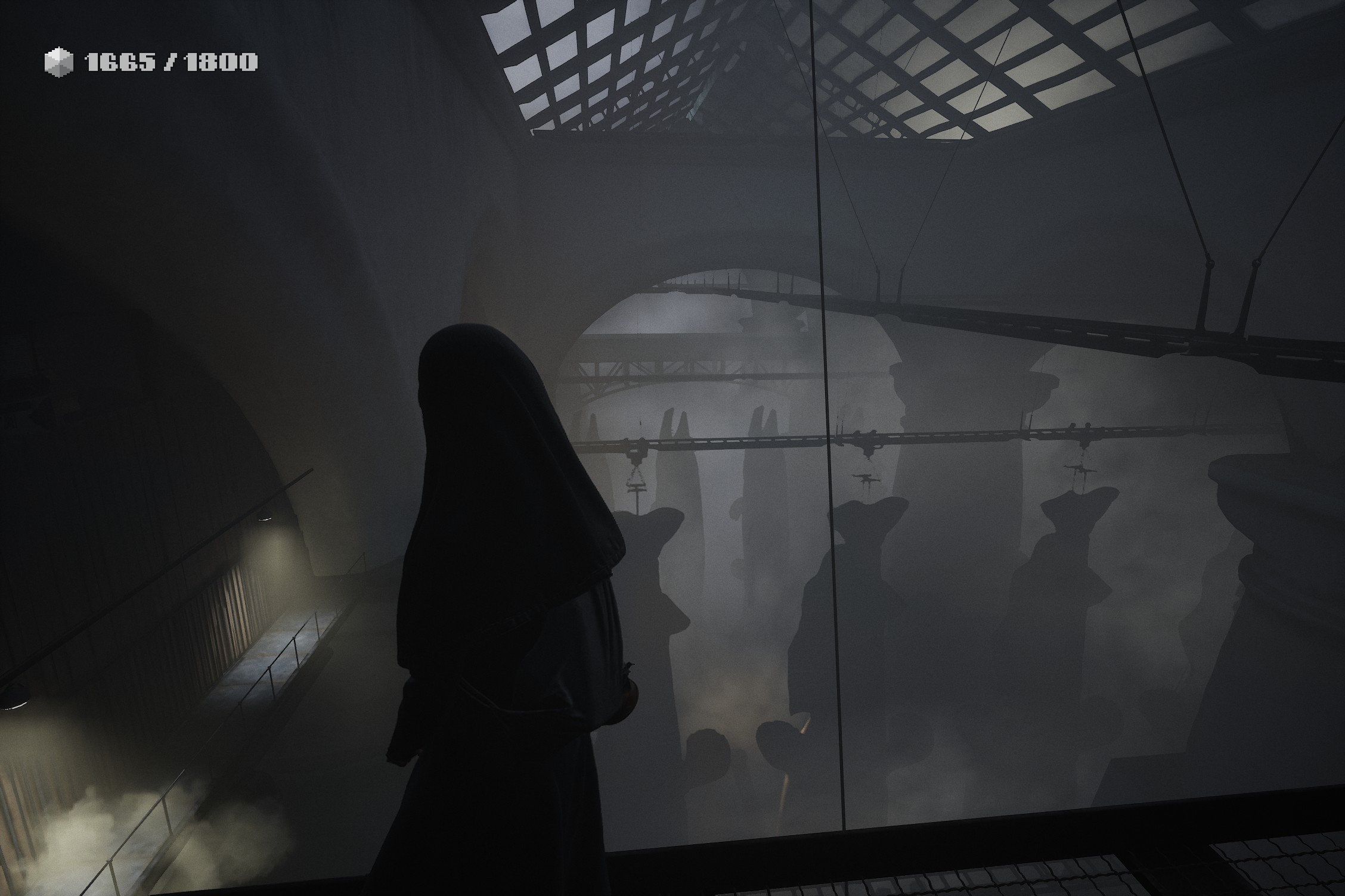 Indika stands on an elevated walkway in a bleak factory. Below her, drying while hanging from conveyor belts, are huge fish, close to a hundred times larger than their IRL counterparts.